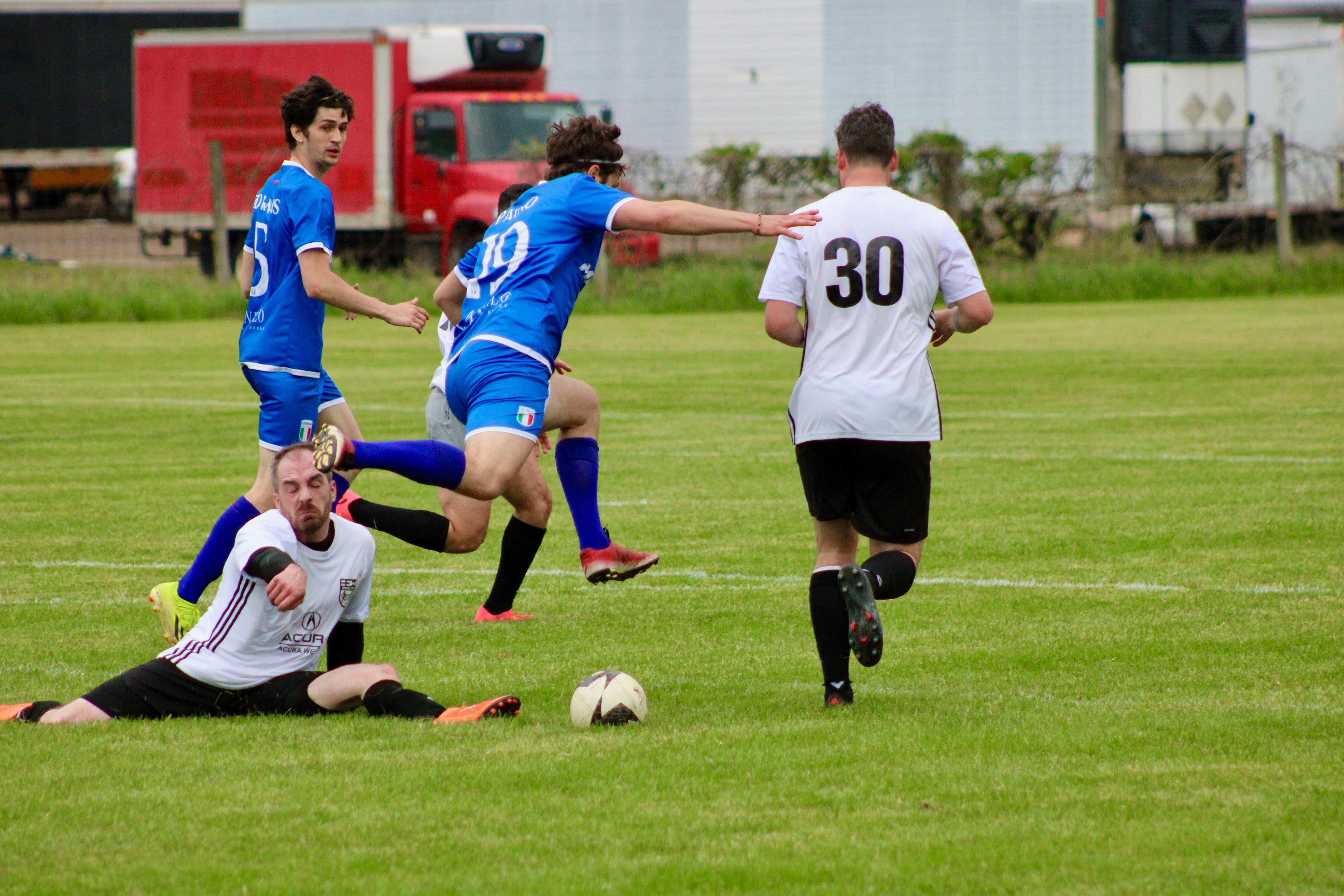 Dynamic soccer action with sliding tackle