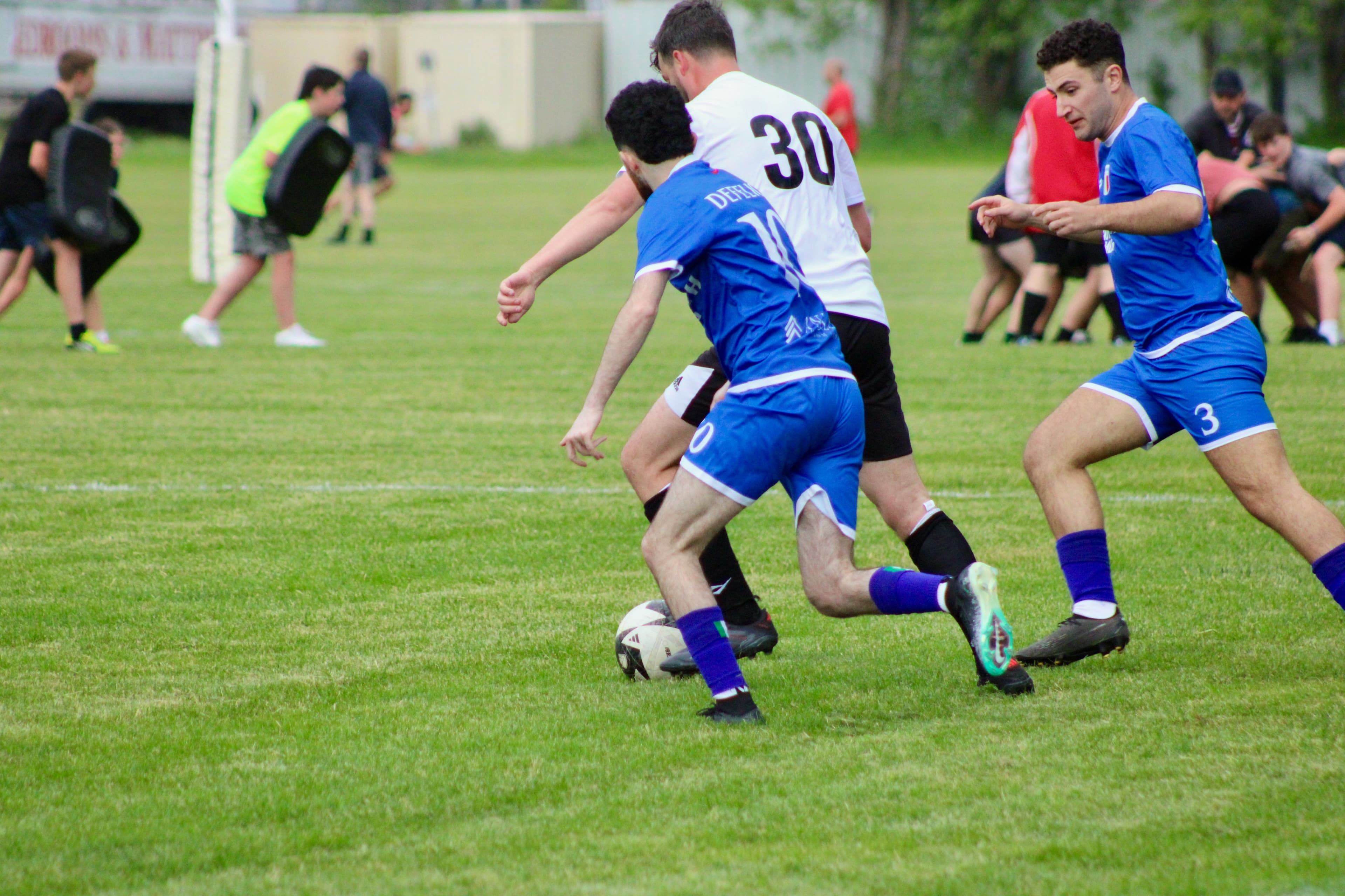 Soccer players in tactical formation during play